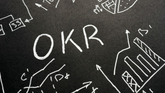 visual of OKR written on a chalk board